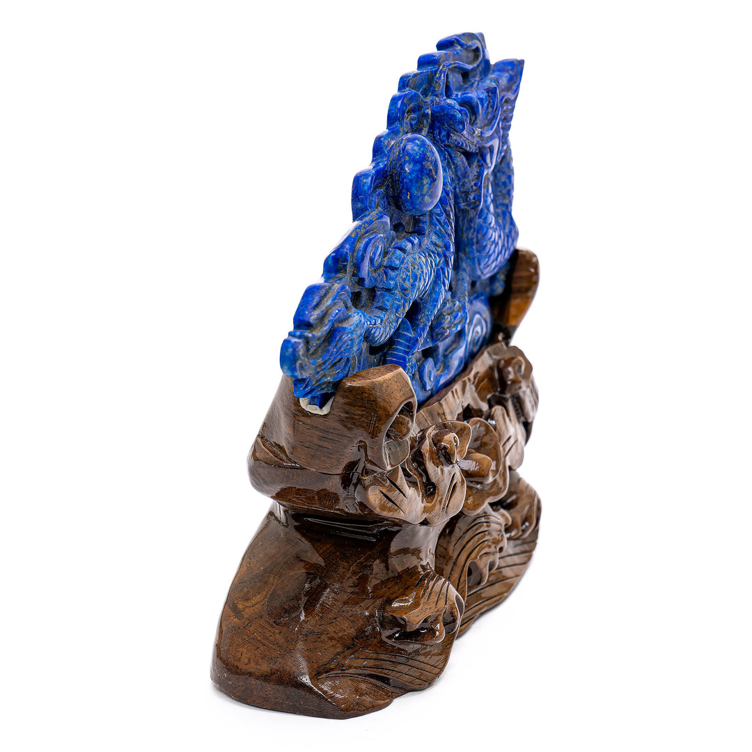 Intricate dragon relief carving in deep blue lapis.