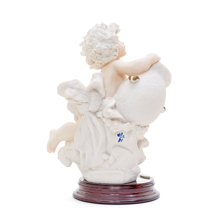 Artisanal Aquarius zodiac sign porcelain figurine from Italy.