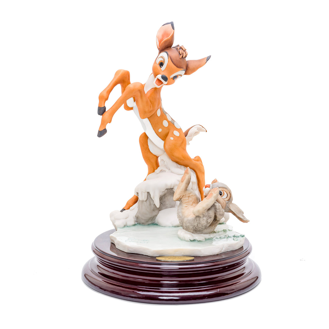 Playful porcelain sculpture of a fawn and rabbit by Giuseppe Armani.