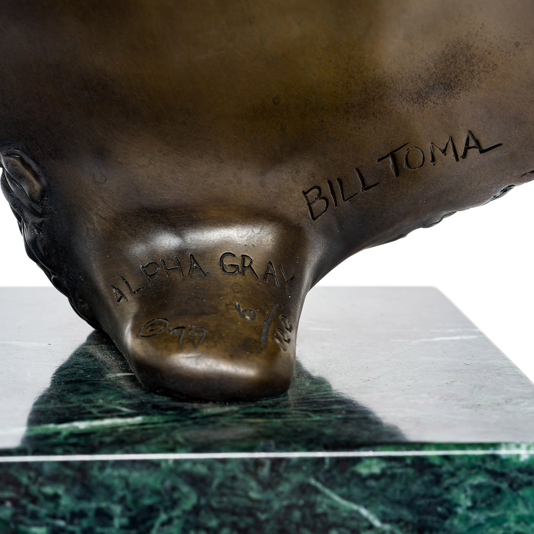 Majestic alpha wolf sculpture on marble base