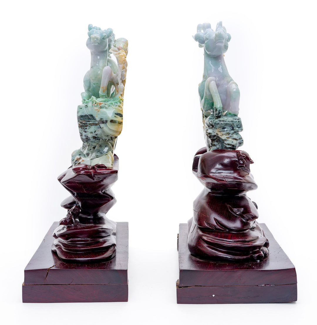 Dynamic mirror image reindeer in jade, showcasing exquisite craftsmanship