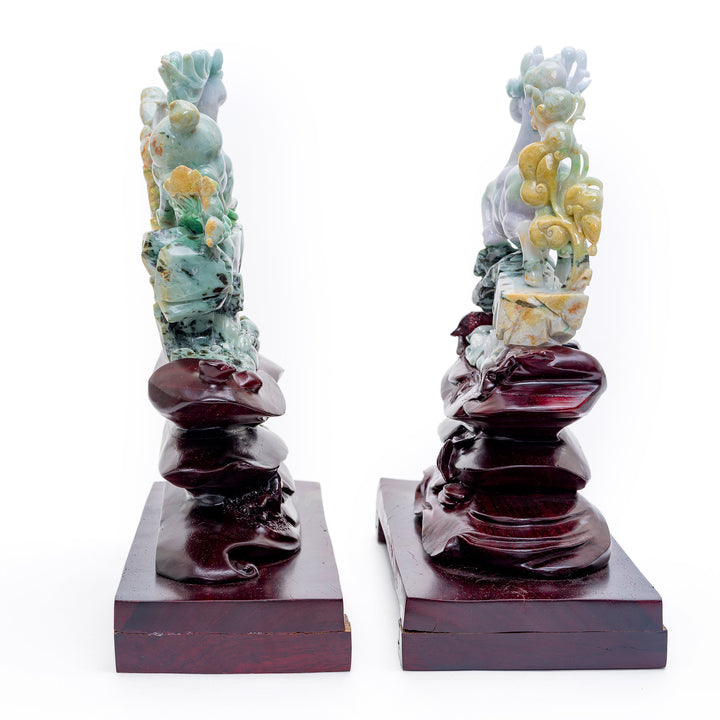 Artistic precision in mirror image jade reindeer on custom-fitted wood bases