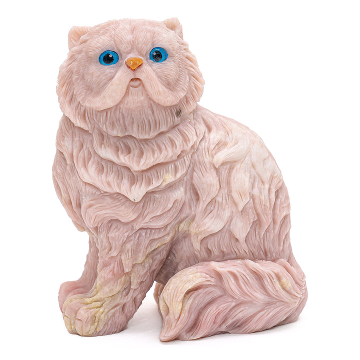 Rose quartz cat figurine with tranquil blue eyes