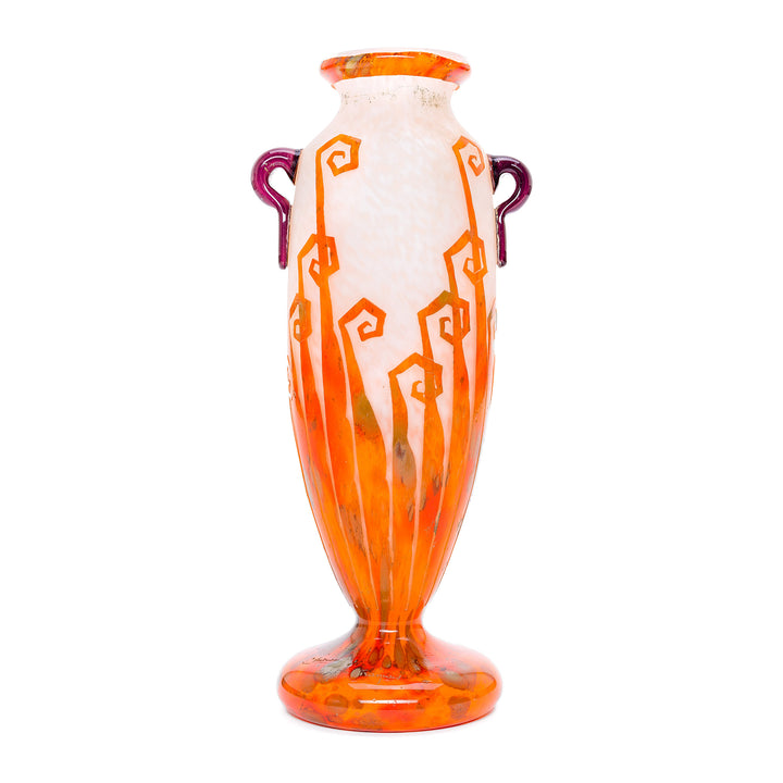 Fluted orange vase with geometric patterns in Art Deco style.