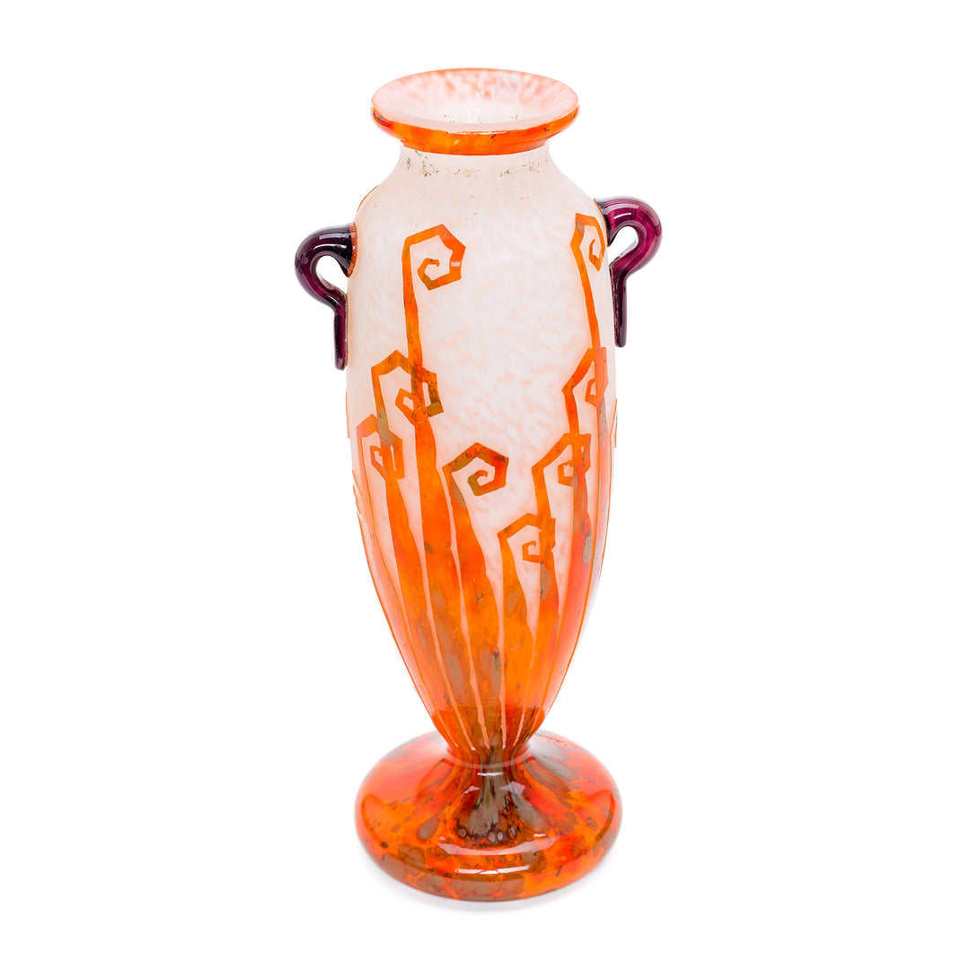 Antique orange vase with stylized Art Deco design and elegant handles.