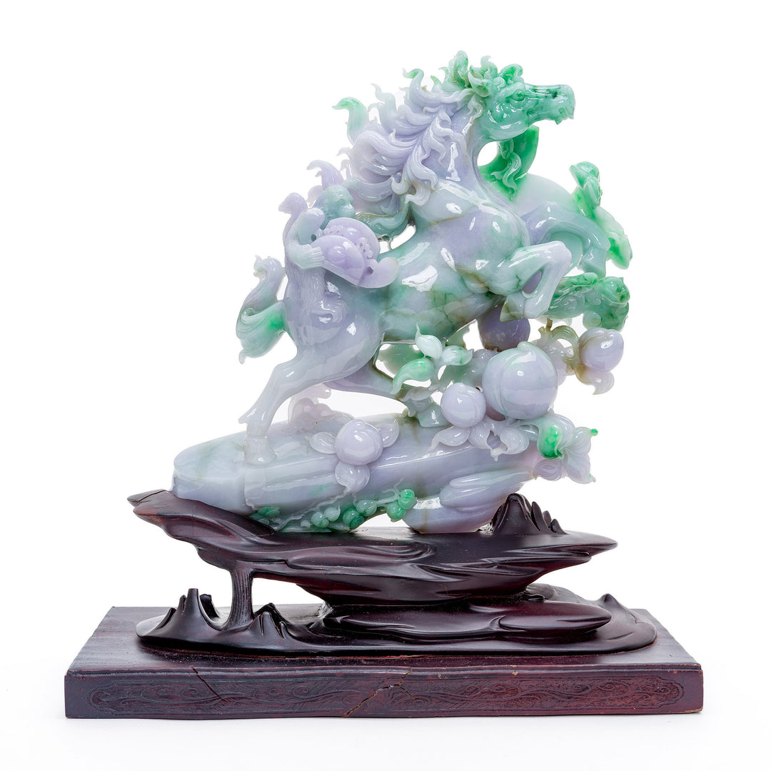 Carved jade stallion with hues of lavender and apple green, a spirited sculpture