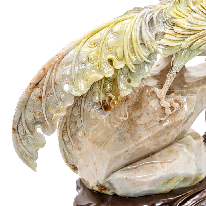 Elegant agate sculpture of a Bird of Paradise on a wooden base.