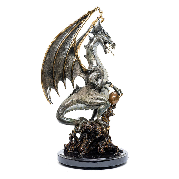 Guardian dragon holding a golden orb