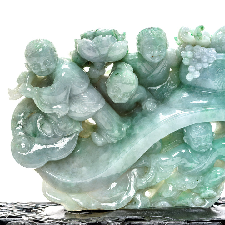 Heirloom jade statue of children's playful innocence.