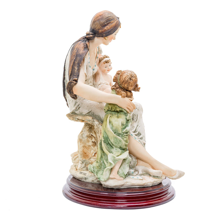 Elegant 'Pride and Joy' porcelain sculpture capturing the essence of motherhood.