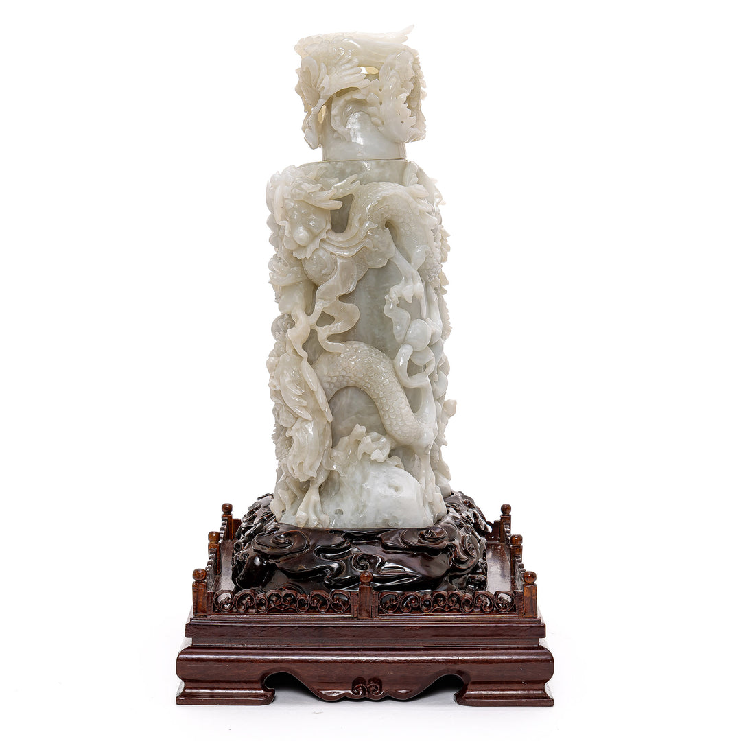 Exquisite dragons of wisdom hand-carved in jade.