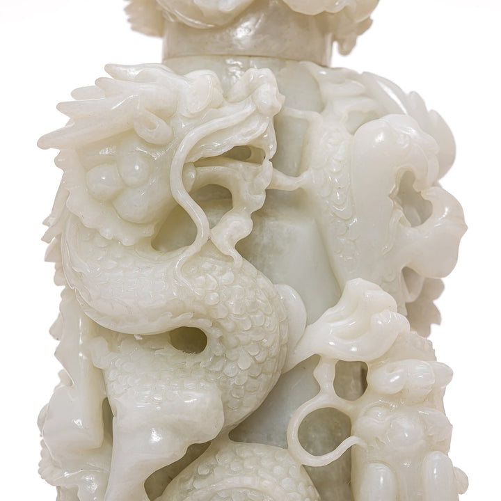 Jade sculpture of legendary dragons in pursuit of knowledge.