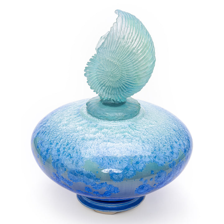 Sea blue & aqua porcelain vessel echoing oceanic depths.