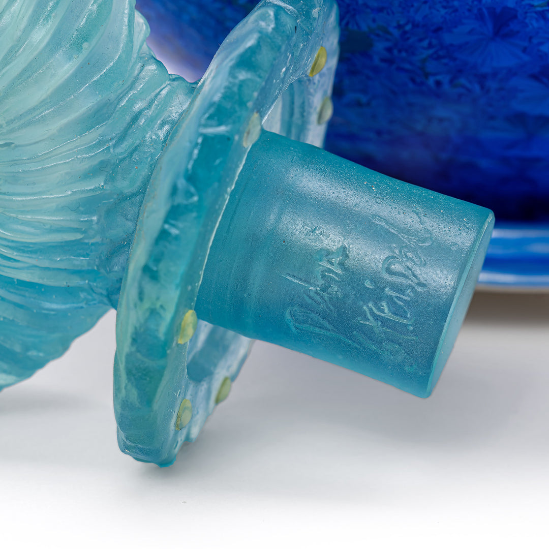 Sea-inspired porcelain masterpiece with a radiant glass finial.