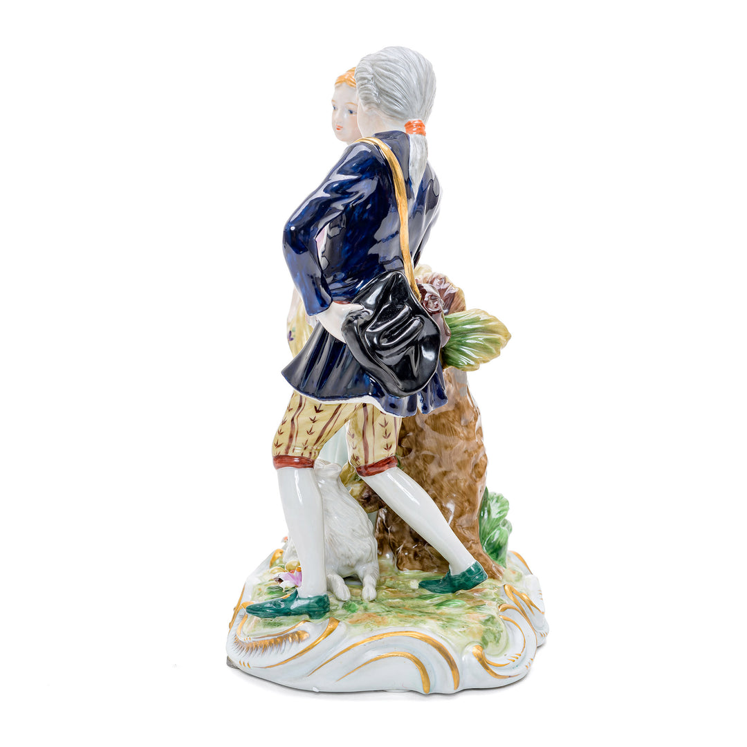 Exquisite figurine depicting a romantic couple in a pastoral setting.