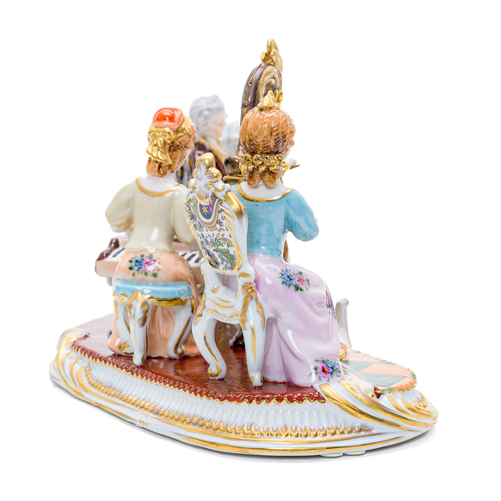 Elegant handmade figurine of a musical group performing in porcelain.