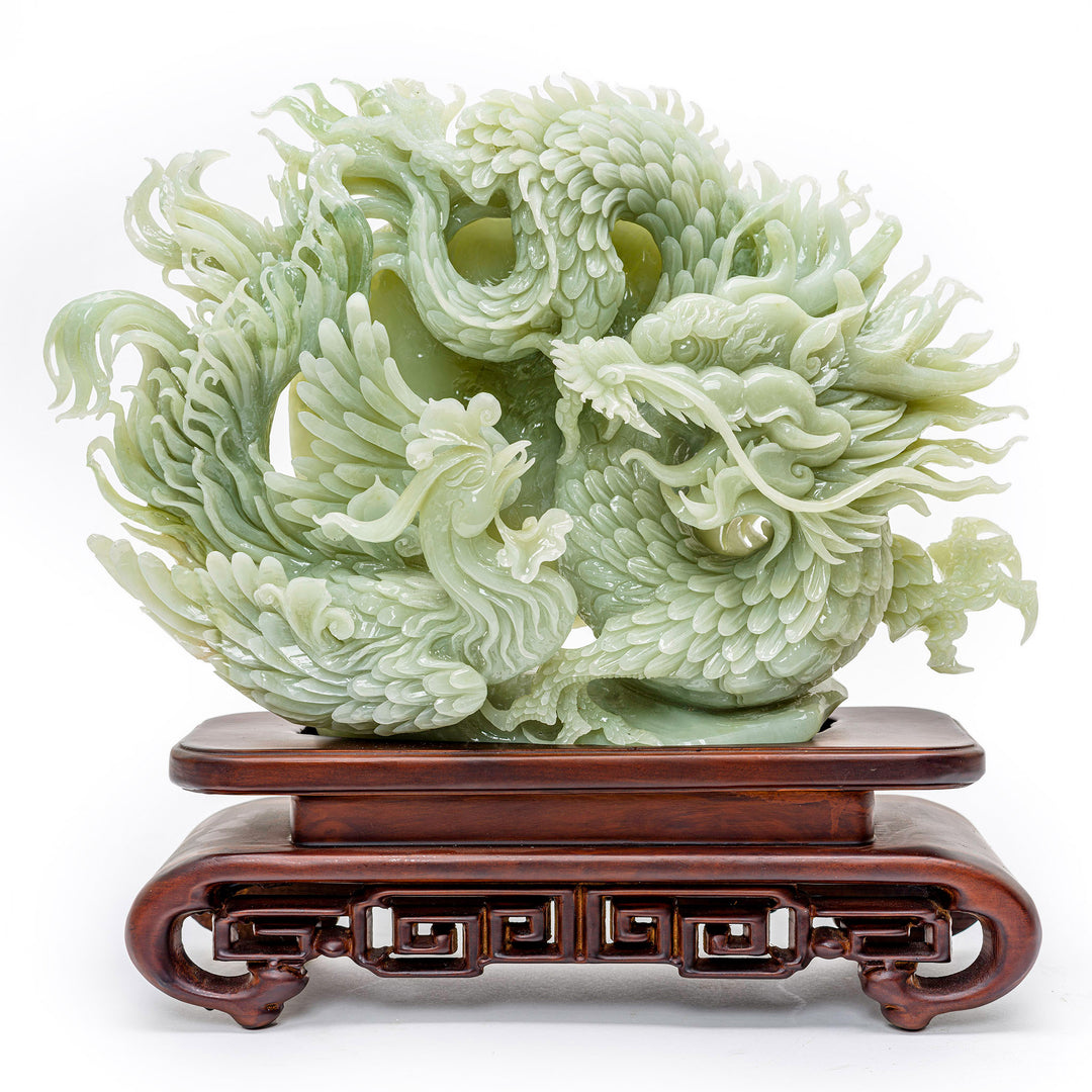 Handcrafted dragon and phoenix agate sculpture depicting balance.