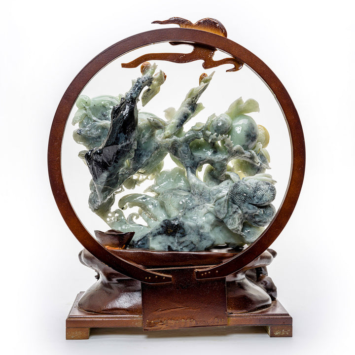Artisan-crafted agate sculpture with ripe peach motif.