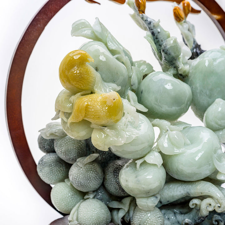 Exquisite agate fruit sculpture signifying wealth and well-being.