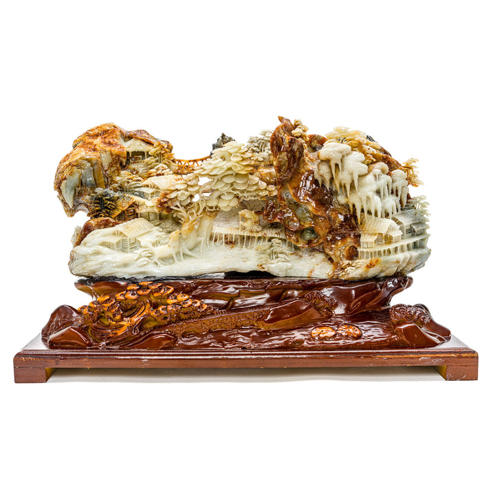 Artisan agate carving of mountainside village
