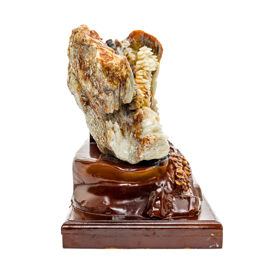 Agate stone village carved within mountainous terrain
