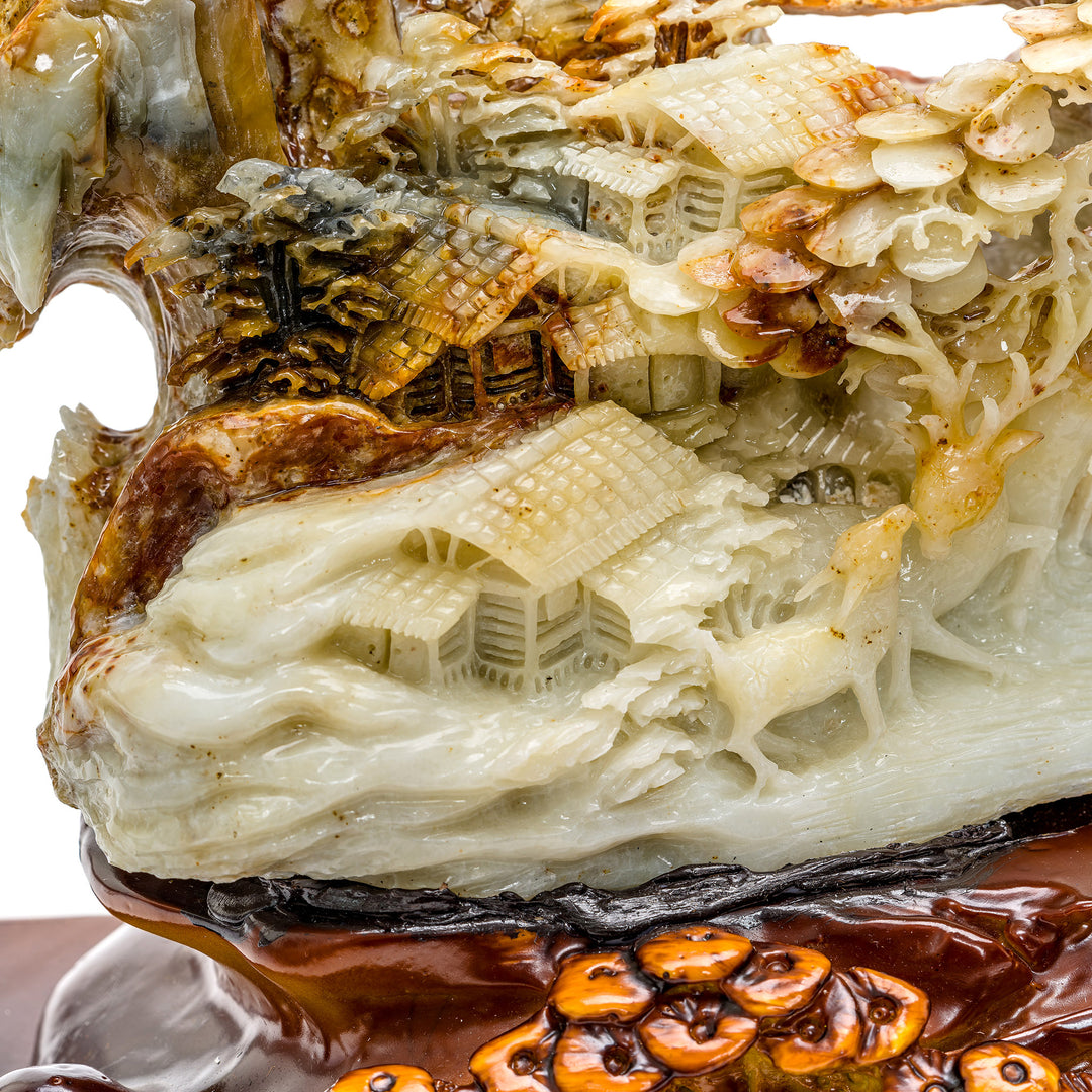Sculpted agate village with mountain and forest detail