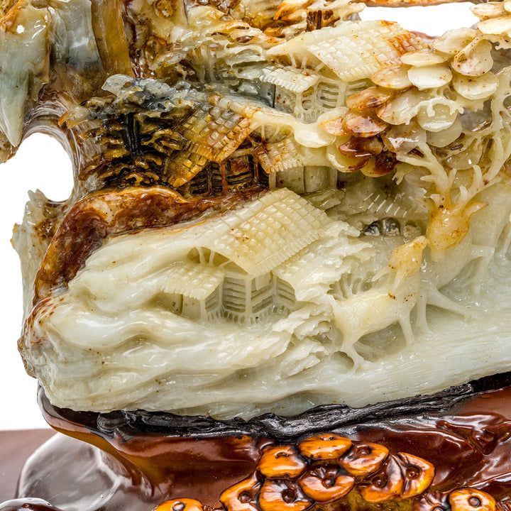Sculpted agate village with mountain and forest detail
