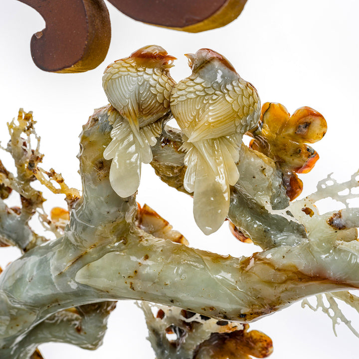 Agate and wood sculpture of peony flowers, a masterpiece of floral art.