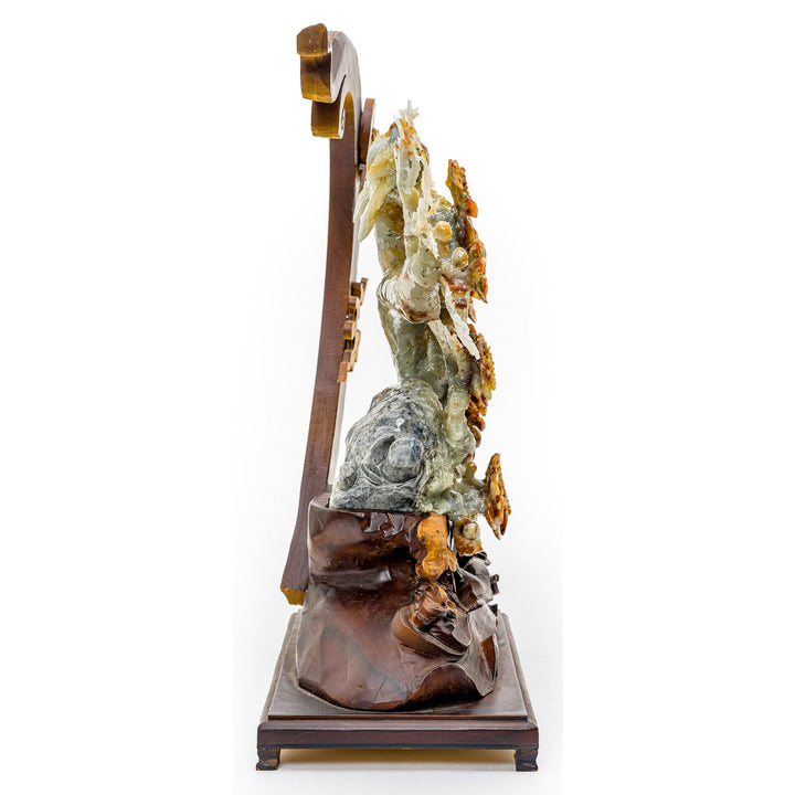 Lifelike agate peony blossoms on a handcrafted wooden stand.