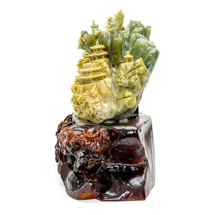 Artisan agate sculpture of mountainside pagoda village