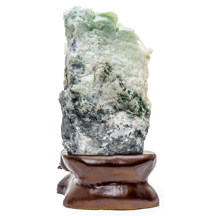 Artistic sculpture of crane group on agate hillside with wooden base.