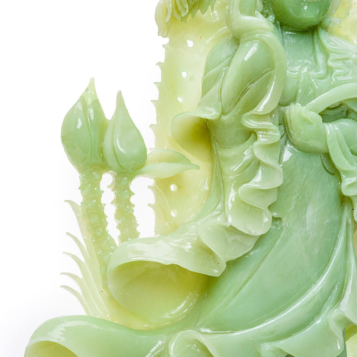 Handcrafted agate statue of Kwan Yin with lotus, a symbol of spiritual enlightenment.