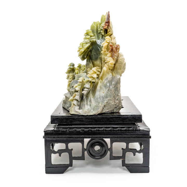 Detailed agate carving of a traditional mountain village