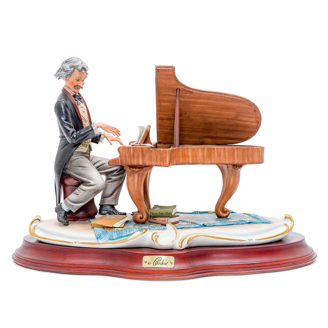 Capodimonte porcelain pianist at grand piano figurine.