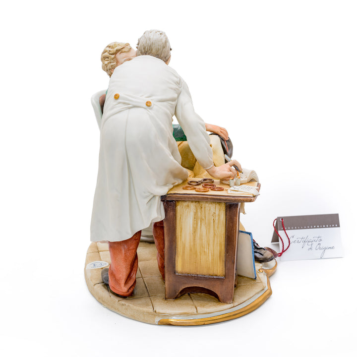 Artistic Capodimonte figurine of an ophthalmologist at work.