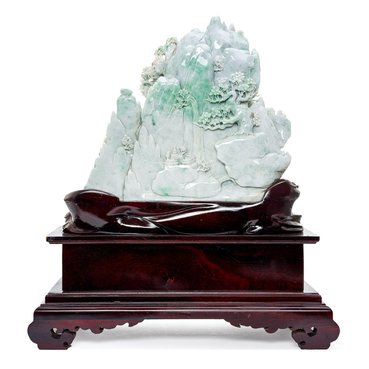Sculptural Jadeite Village Scene Set on Ornate Wooden Base.