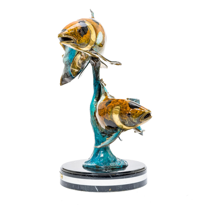Bronze sculpture of two Koi fish in a dynamic pose