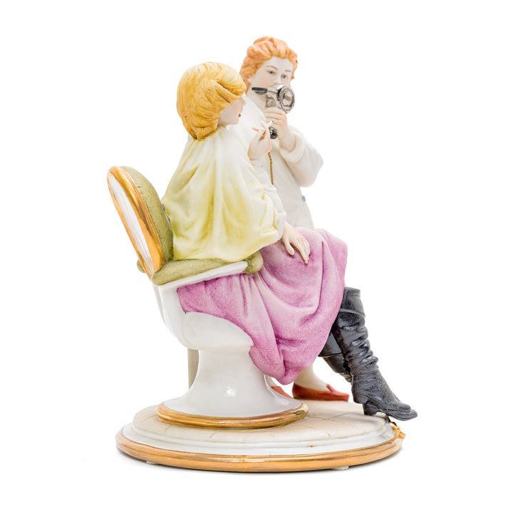 Porcelain representation of a salon experience by Capodimonte.