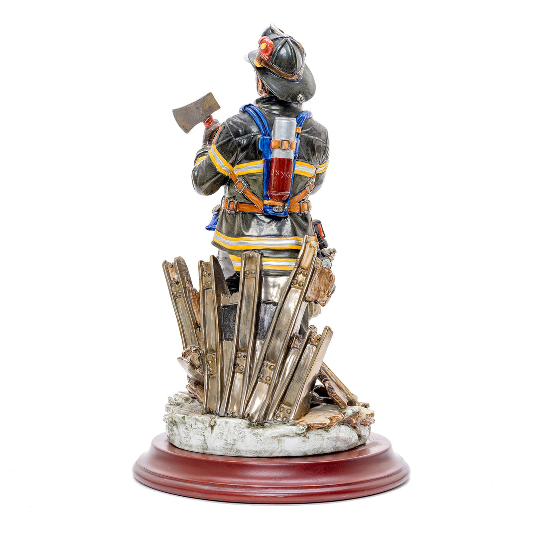 Porcelain representation of a firefighter by Capodimonte.