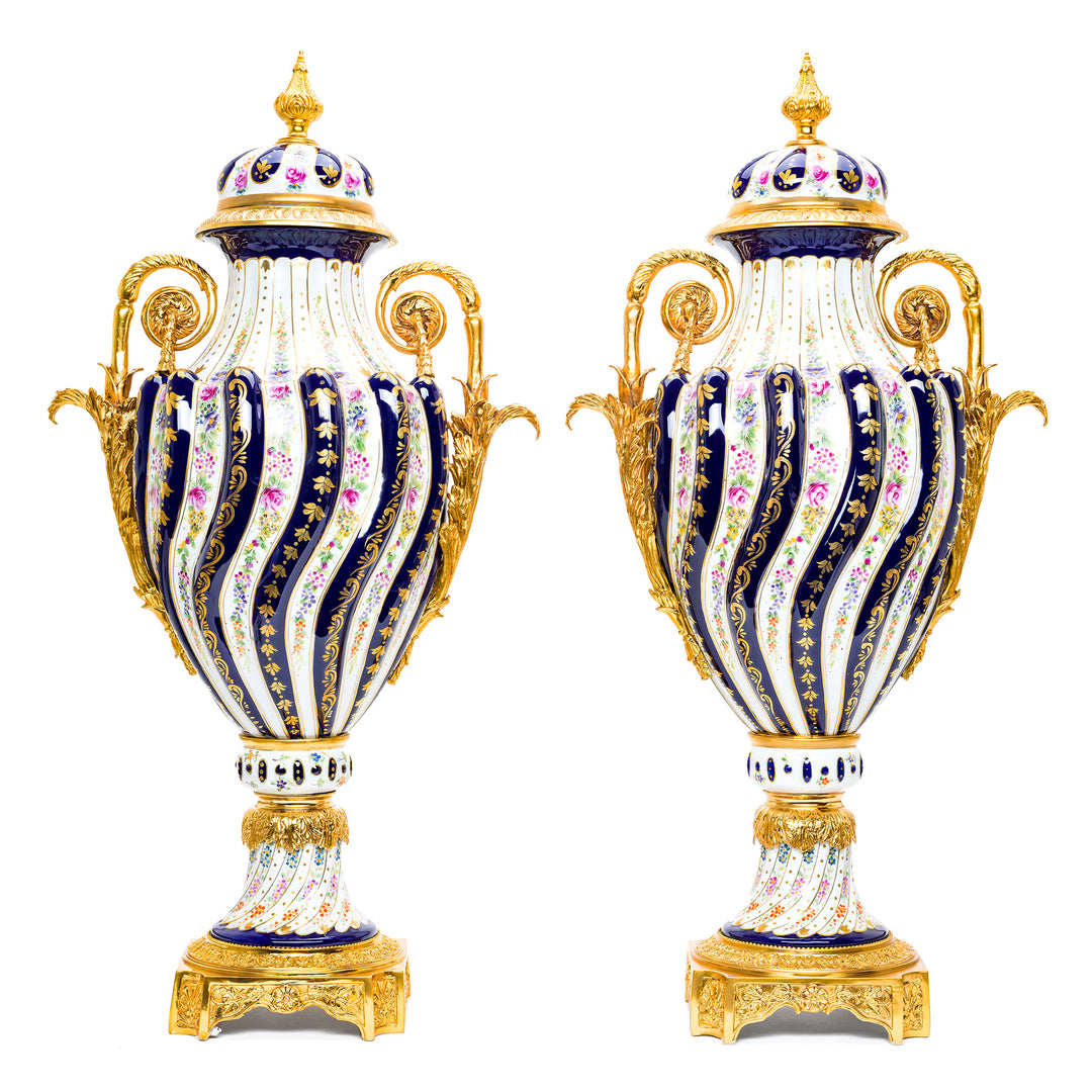 Pair of white and cobalt blue porcelain vases with gold accents