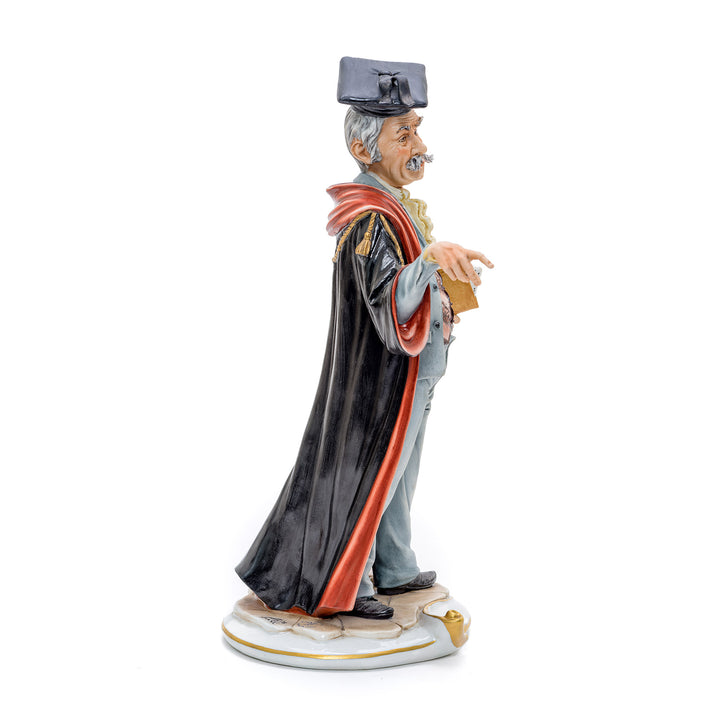 Porcelain representation of a lawyer in legal robes by Capodimonte.
