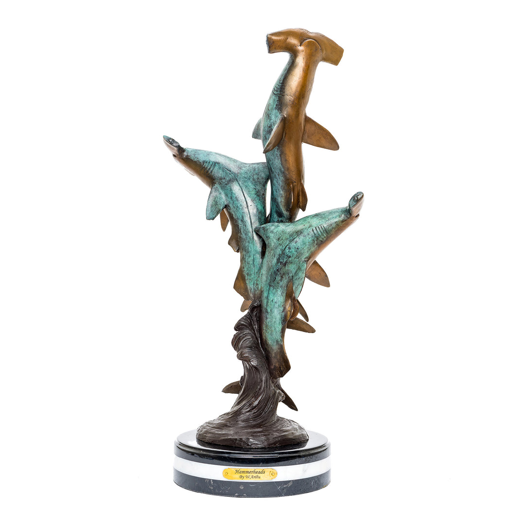 Bronze hammerhead shark trio sculpture on marble base