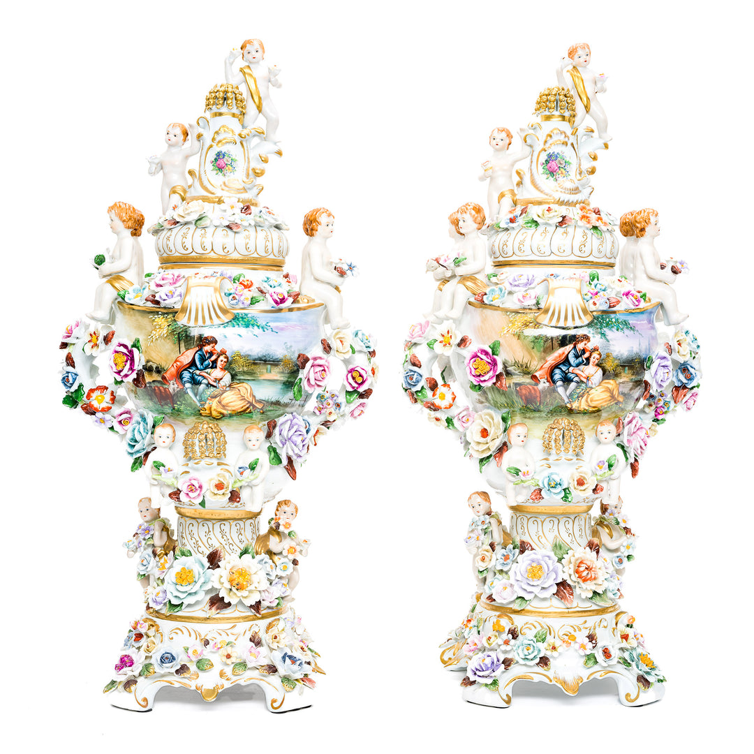 Royal porcelain vases with hand-painted cherubs and flowers