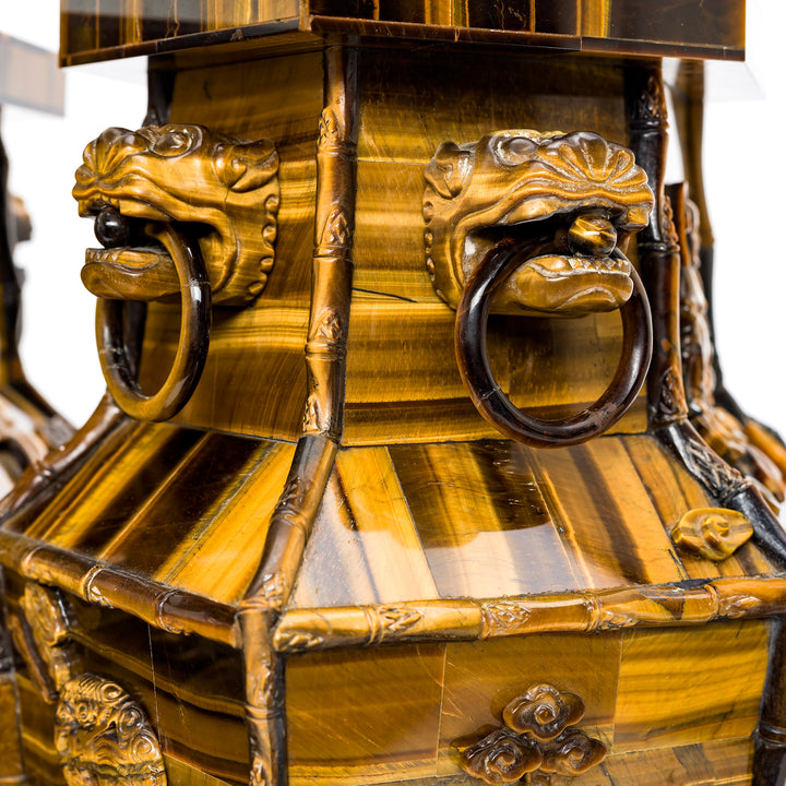 Close-up of hand-carved details on Tiger Eye vases