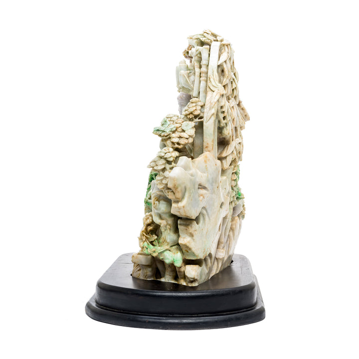 Side view of jade grouping with intricate carvings