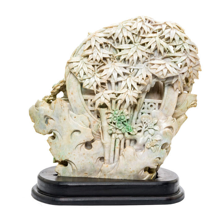 Rear view of jade grouping statue on wood base