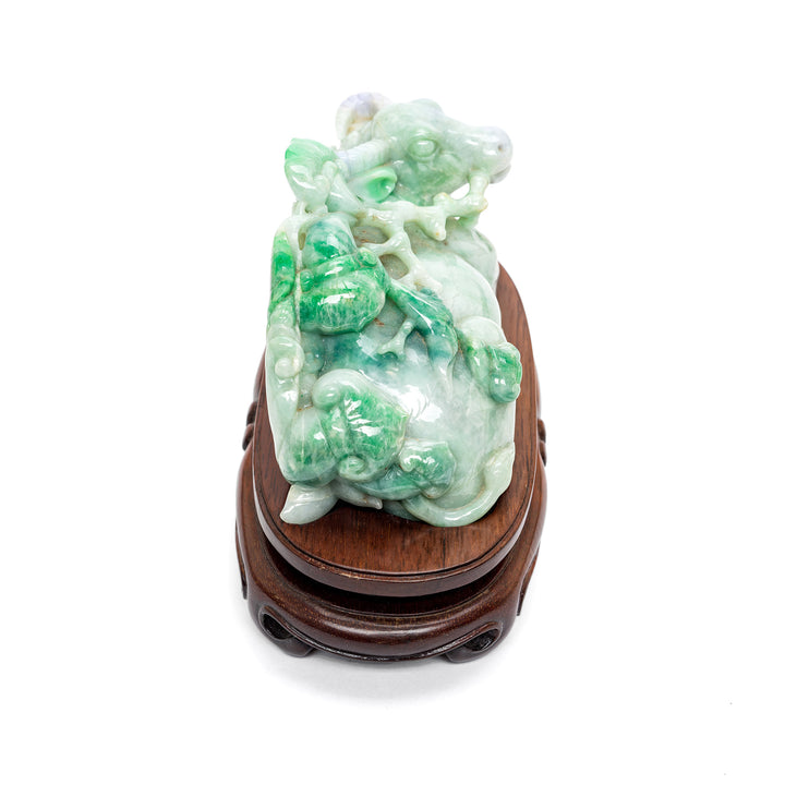 Elegant jade and wood decorative sculpture