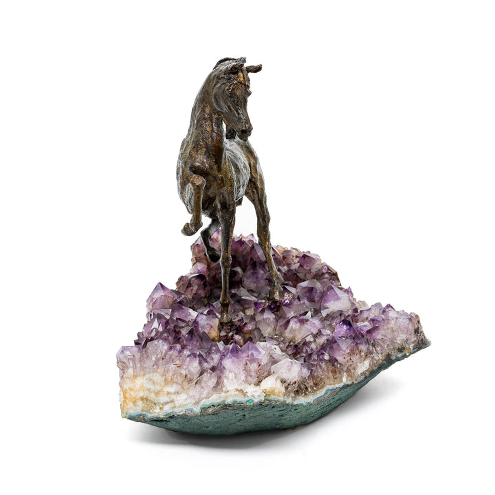 Bronze stallion with flowing mane and gemstone footing