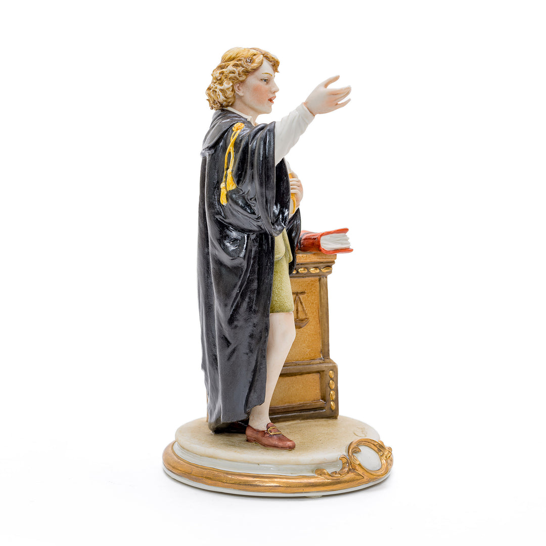 Porcelain representation of a female lawyer by Capodimonte.