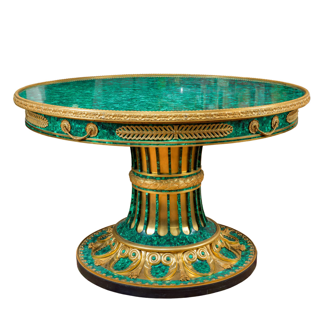 Magnificent empire style malachite table with luxurious doré bronze trims.